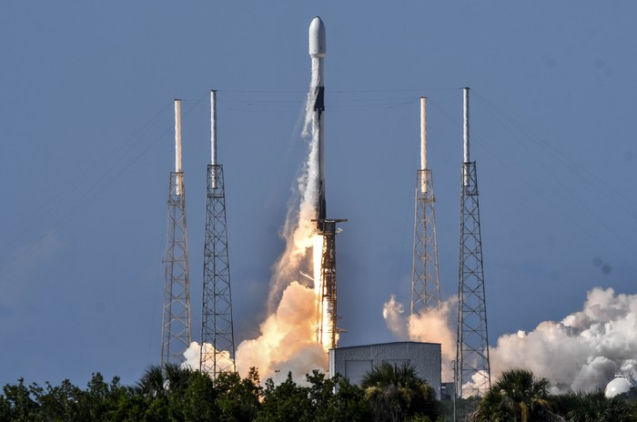 A SpaceX Falcon 9 lifts off from Cape Canaveral Air Force Station, Fla., Monday, July 20, 2020. The rocket is carrying ANASIS II, a national security satellite for South Korea. (Craig Bailey/Florida Today via AP)