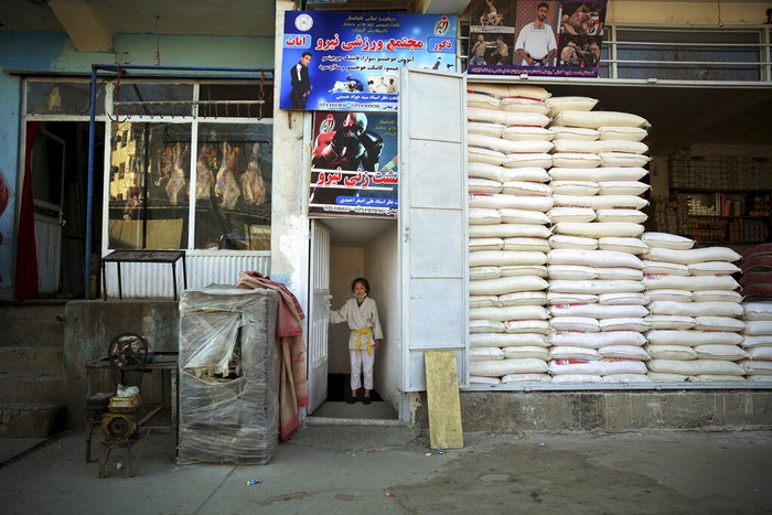 Afghanistan Womens Martial Arts Photo Essay Jiu Jitsu club members look at a wall with posters at their club ahead of a training session in Kabul, Afghanistan, Saturday, Feb. 15, 2020. In war-torn Afghanistan gender discrimination has deep cultural and historical roots and many women suffer from domestic violence, jujitsu seems an ideal sport for women, it teaches a person self-defense when faced with a stronger and heavier opponent by using specific techniques, holds and principles of leverage. Under the Taliban, women were not allowed to go to school, work outside the home or leave their house without a male escort. (AP Photo/Tamana Sarwary)