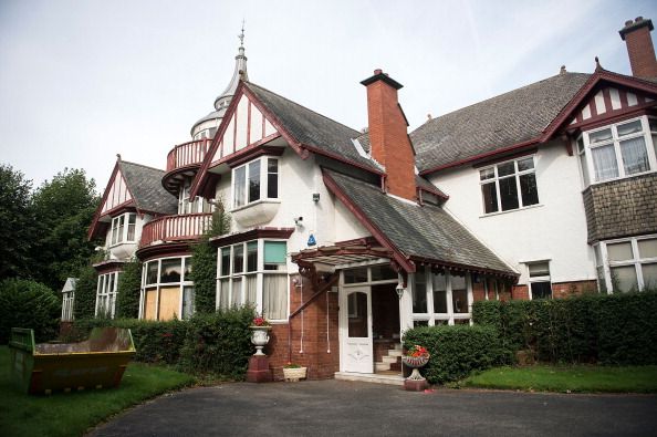 HARROGATE, ENGLAND - SEPTEMBER 04:  A general view of the front of Pineheath on September 4, 2013 in Harrogate, England. An untouched 40-bedroom house belonging to wealthy Indian-born aristocrats, Sir Dhunjibhoy and Lady Bomanji,  who were well-known figures in British high society at the start of the 20th century and friends of the Royal Family. Sir Dhunjibhoy was a Bombay-based shipping magnate who also used his wealth to support Britain's war effort against the Nazis which led to him being knighted. Their 12-bathroom mansion in Harrogate was where they spent each autumn after staying at their house in Windsor during the summer and the winters in Poona, India. The mansion, has been sold in a multi-million pound sale to a local businessman who plans to make it a family home again after Lady Bomanjis daughter, Mrs Mehroo Jehangir, died in 2012 having not touched it since 1986 when her mother died.  (Photo by Bethany Clarke/Getty Images)