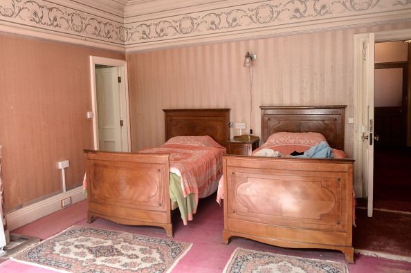 HARROGATE, ENGLAND - SEPTEMBER 04:  A general view of the front of Pineheath on September 4, 2013 in Harrogate, England. An untouched 40-bedroom house belonging to wealthy Indian-born aristocrats, Sir Dhunjibhoy and Lady Bomanji,  who were well-known figures in British high society at the start of the 20th century and friends of the Royal Family. Sir Dhunjibhoy was a Bombay-based shipping magnate who also used his wealth to support Britain's war effort against the Nazis which led to him being knighted. Their 12-bathroom mansion in Harrogate was where they spent each autumn after staying at their house in Windsor during the summer and the winters in Poona, India. The mansion, has been sold in a multi-million pound sale to a local businessman who plans to make it a family home again after Lady Bomanjis daughter, Mrs Mehroo Jehangir, died in 2012 having not touched it since 1986 when her mother died.  (Photo by Bethany Clarke/Getty Images)