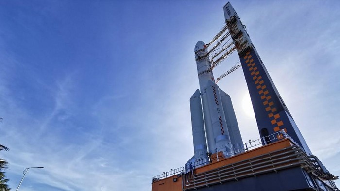 This photo taken on July 17, 2020 shows a Long March 5 rocket being transferred before a planned launch in Wenchang in Chinas southern Hainan province. - After sending humans into orbit and landing a probe on the Moon, China is aiming for another milestone in its space ambitions with the launch of a Mars rover between July 20 and 25. (Photo by STR / AFP) / China OUT
