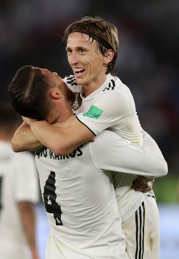 ABU DHABI, UNITED ARAB EMIRATES - DECEMBER 22:  Sergio Ramos and Luka Modric of Real Madrid celebrate after their team's fourth goal during the FIFA Club World Cup UAE 2018 Final between Al Ain and Real Madrid at the Zayed Sports City Stadium on December 22, 2018 in Abu Dhabi, United Arab Emirates.  (Photo by Francois Nel/Getty Images)