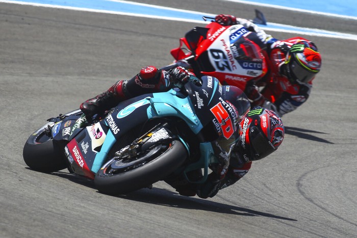 MotoGP rider Fabio Quartararo of France steers his motorbike ahead of Francesco Bagnaia of Italy, during the Spanish Motorcycle Grand Prix at the Angel Nieto racetrack in Jerez de la Frontera, Spain, Sunday, July 19, 2020. (AP Photo/David Clares)