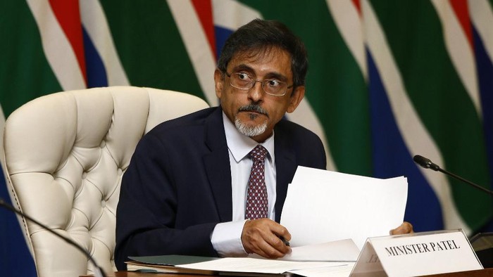 (FILES) In this file photo taken on March 24, 2020 South African Trade and Industry Minister Ebrahim Patel looks on during a press conference with Members of the National Command Councils Economic Cluster to outline in detail governments intervention measures on COVID-19 coronavirus at the OR Tambo Building in Pretoria. - Patel on July 25, 2020 tested positive for COVID-19, the cabinet said, the fourth minister to contract the virus in Africas hardest-hit country. Cabinet spokeswoman Phumla Williams said in a statement that Patel, 58, received his results on July 25. (Photo by Phill Magakoe / POOL / AFP)