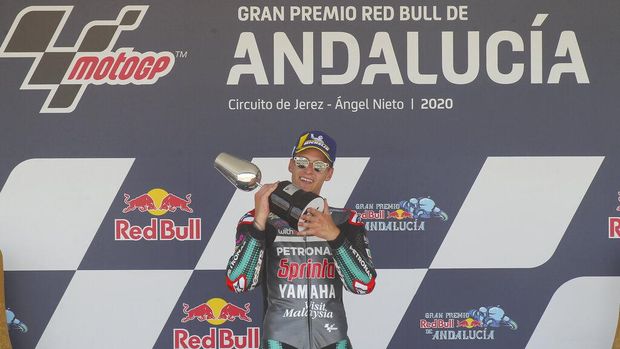 Yamaha rider Fabio Quartararo of France holds the trophy after winning the MotoGP race during the Andalucia Motorcycle Grand Prix at the Angel Nieto racetrack in Jerez de la Frontera, Spain, Sunday July 26, 2020. (AP Photo/David Clares)