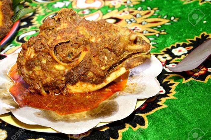curry goat head curry goat head on the plate