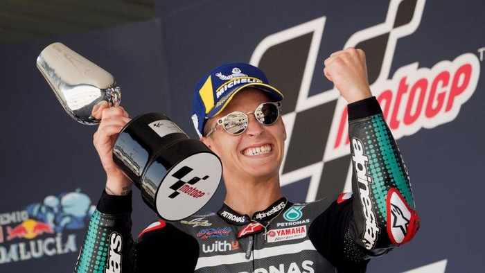 JEREZ DE LA FRONTERA, SPAIN - JULY 26: Fabio Quartararo of France and Petronas Yamaha SRT   celebrates the victory on the podium  during the MotoGP race during the MotoGP of Andalucia - Race at Circuito de Jerez on July 26, 2020 in Jerez de la Frontera, Spain. (Photo by Mirco Lazzari gp/Getty Images)