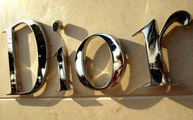 Logo Dior CANNES, FRANCE - MAY 19: The Dior logo is shown on the front of a Dior store during the 56th International Cannes Film Festival 2003 May 19, 2003 in Cannes, France. Thousands of people are attending the festival for movie premieres, deal-making and parties. (Photo by Scott Barbour/Getty Images)