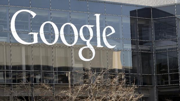 FILE - Google's headquarters in Mountain View, Calif., is shown Thursday, Jan. 3, 2013. Google has decided that most of its 200,000 employees and contractors should work from home through next June, a sobering assessment of the pandemic's potential staying power from the company providing the answers for the world's most trusted internet search engine. The remote-work order issued Monday, July 27, 2020, by Google CEO Sundar Pichai also affects other companies owned by Google's corporate parent, Alphabet Inc. It marks a six-month extension of Google's previous plan to keep most of its offices closed through the rest of this year.(AP Photo/Marcio Jose Sanchez, File)