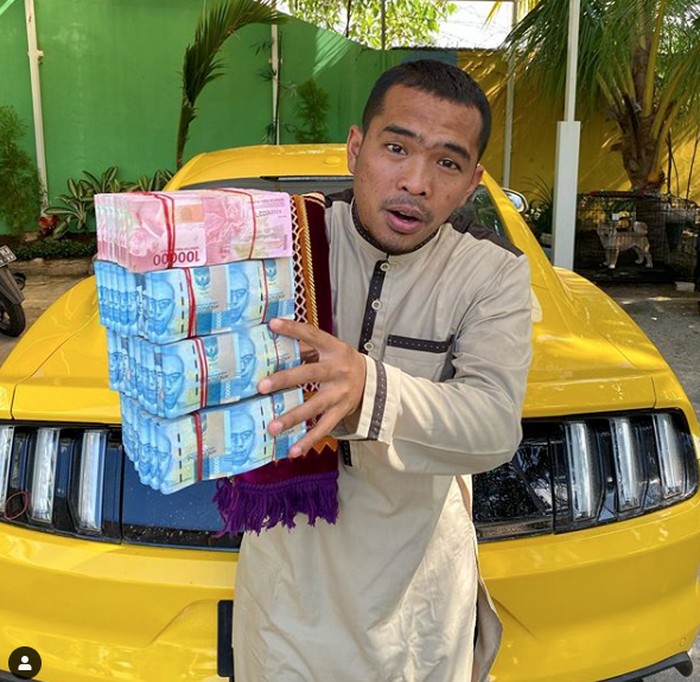 Putra Siregar Putra Siregar, pemilik PS Store yang dijadikan tersangka kasus hp ilegal.
