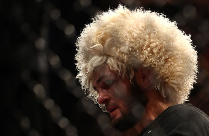 ABU DHABI, UNITED ARAB EMIRATES - SEPTEMBER 07: Khabib Nurmagomedov of Russia celebrates his submission victory over Dustin Poirier Dustin of United States in their Lightweight Title Bout during the UFC 242 event at The Arena on September 07, 2019 in Abu Dhabi, United Arab Emirates. (Photo by Francois Nel/Getty Images)