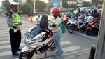 Lewati Garis Saat Lampu Merah, Ini Sanksi Tilangnya!