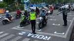 Lewati Garis Saat Lampu Merah, Ini Sanksi Tilangnya!