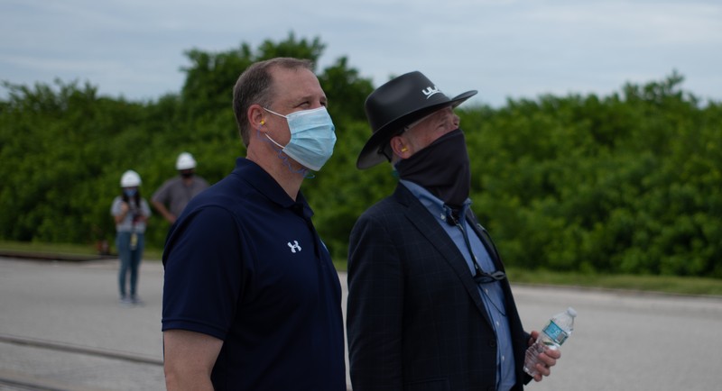 Alexander Mather, of Burke, Va. stands next to a model of the Mars 2020 rover he named in a contest during a news conference at the Kennedy Space Center Tuesday, July 28, 2020, in Cape Canaveral, Fla. Mather, submitted the winning entry in NASA's 