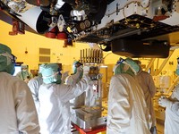 Alexander Mather, of Burke, Va. stands next to a model of the Mars 2020 rover he named in a contest during a news conference at the Kennedy Space Center Tuesday, July 28, 2020, in Cape Canaveral, Fla. Mather, submitted the winning entry in NASAs 