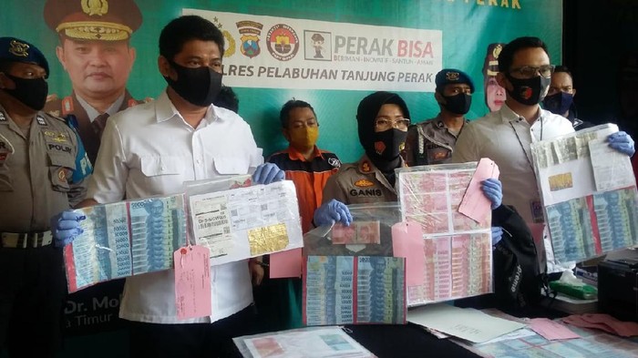 uang palsu di surabaya