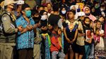 Antusias Warga Demak Berebut Nasi Ancak di Malam Idul Adha