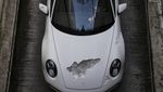 Penampakan Porsche yang Sengaja Dibuat Bopeng Bak Fosil 1.000 Tahun Lagi