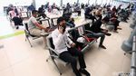 Suasana Mudik H-1 Idul Adha di Stasiun Pasar Senen
