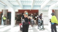 Suasana hari pertama kedatangan domestik di Bandara I Gusti Ngurah Rai, Bali (Angga Riza/detikcom)