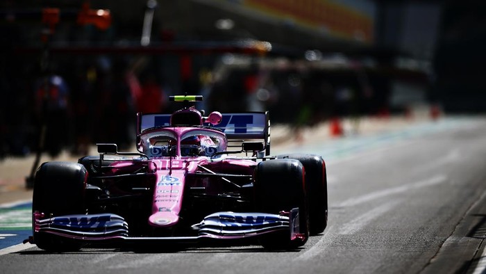 NORTHAMPTON, ENGLAND - JULY 31: Lance Stroll of Canada driving the (18) Racing Point RP20 Mercedes in the Pitlane  during practice for the F1 Grand Prix of Great Britain at Silverstone on July 31, 2020 in Northampton, England. (Photo by Peter Fox/Getty Images)