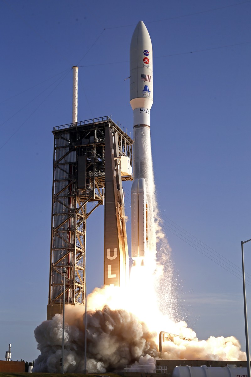 This photo provided by NASA, a United Launch Alliance Atlas V rocket launches at Space Launch Complex 41 at the Cape Canaveral Air Force Station, Thursday, July 30, 2020, in Cape Canaveral, Fla. NASA's Perseverance blasted off  atop an Atlas V rocket Thursday morning. It's the first step in an ambitious project to bring the first Martian rock samples back to Earth to be analyzed for evidence of ancient life.  (Joel Kowsky/NASA via AP)