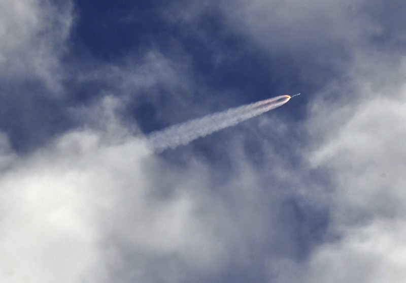 This photo provided by NASA, a United Launch Alliance Atlas V rocket launches at Space Launch Complex 41 at the Cape Canaveral Air Force Station, Thursday, July 30, 2020, in Cape Canaveral, Fla. NASA's Perseverance blasted off  atop an Atlas V rocket Thursday morning. It's the first step in an ambitious project to bring the first Martian rock samples back to Earth to be analyzed for evidence of ancient life.  (Joel Kowsky/NASA via AP)
