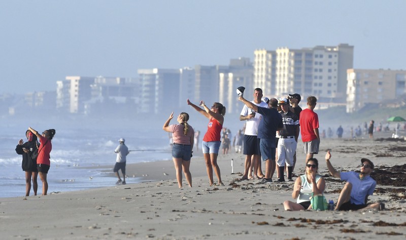 This photo provided by NASA, a United Launch Alliance Atlas V rocket launches at Space Launch Complex 41 at the Cape Canaveral Air Force Station, Thursday, July 30, 2020, in Cape Canaveral, Fla. NASA's Perseverance blasted off  atop an Atlas V rocket Thursday morning. It's the first step in an ambitious project to bring the first Martian rock samples back to Earth to be analyzed for evidence of ancient life.  (Joel Kowsky/NASA via AP)