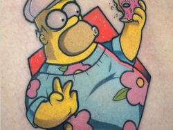 Keren! Seni Tato Gambar Kartun yang Berwarna