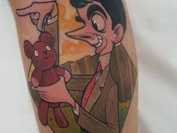 Keren! Seni Tato Gambar Kartun yang Berwarna