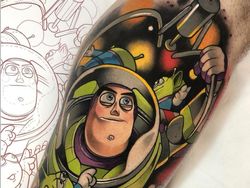 Keren! Seni Tato Gambar Kartun yang Berwarna