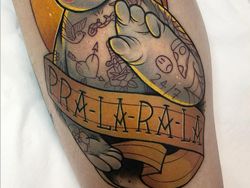 Keren! Seni Tato Gambar Kartun yang Berwarna