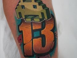 Keren! Seni Tato Gambar Kartun yang Berwarna