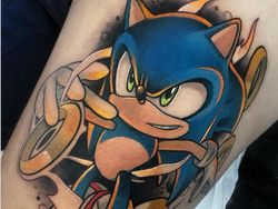 Keren! Seni Tato Gambar Kartun yang Berwarna