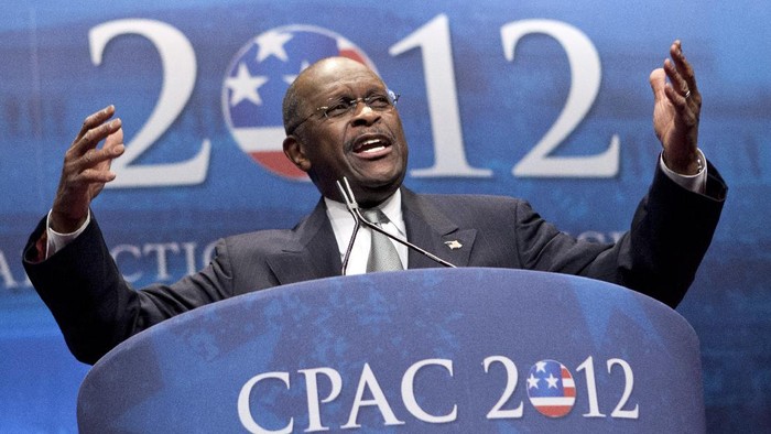 FILE - In this Feb. 9, 2012 file photo, former presidential candidate Herman Cain addresses the Conservative Political Action Conference in Washington.  Cain has died after battling the coronavirus. A post on Cains Twitter account on Thursday, July 30, 2020 announced the death.   (AP Photo/J. Scott Applewhite, File)