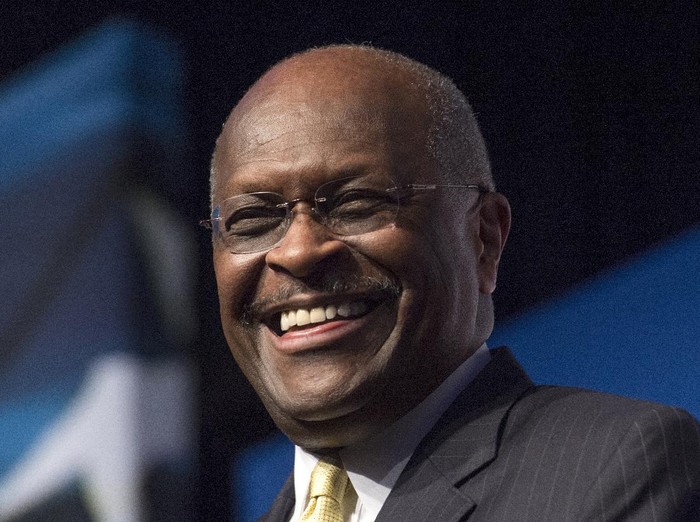 FILE - In this June 20, 2014, file photo, Herman Cain, CEO, The New Voice, speaks during Faith and Freedom Coalitions Road to Majority event in Washington.  Cain has died after battling the coronavirus. A post on Cains Twitter account on Thursday, July 30, 2020 announced the death.  (AP Photo/Molly Riley, File)