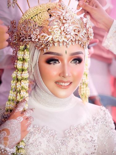 Rully Anggraini, istri Slamwiyono