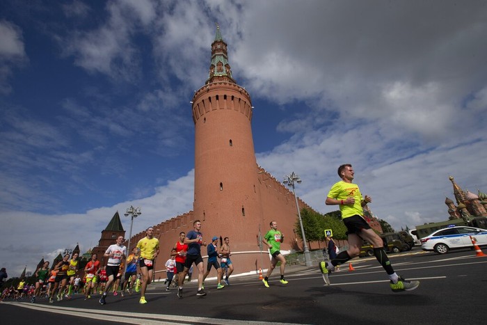 Russia Marathon People run past the Kremlin Wall as they take part in a half-marathon in Moscow, Russia, Sunday, Aug., 2, 2020. Around 17,000 people took part in the race. (AP Photo/Alexander Zemlianichenko Jr)