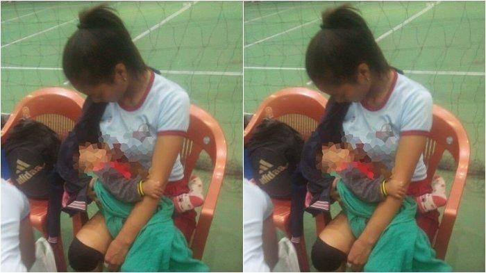 Wanita menyusui bayi