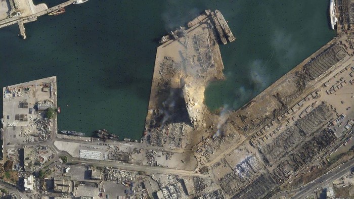 This satellite image taken on Wednesday Aug. 5, 2020 shows the port of Beirut and the surrounding area in Lebanon following a massive blast on Tuesday. Residents of Beirut confronted a scene of utter devastation a day after a massive explosion at the port rippled across the Lebanese capital, killing at least 100 people, wounding thousands and leaving entire city blocks blanketed with glass and rubble. (Planet Labs Inc. via AP)