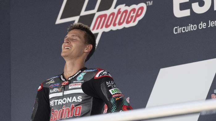 JEREZ DE LA FRONTERA, SPAIN - JULY 19: Fabio Quartararo of France and Petronas Yamaha SRT  celebrates the victory on the podium at the end of the MotoGP race during the MotoGP of Spain - Race at Circuito de Jerez on July 19, 2020 in Jerez de la Frontera, Spain. (Photo by Mirco Lazzari gp/Getty Images)