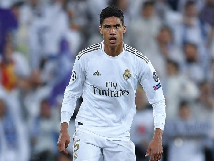 MADRID, SPAIN - FEBRUARY 26: Raphael Varane of Real Madrid CF runs with the ball during the UEFA Champions League round of 16 first leg match between Real Madrid and Manchester City at Bernabeu on February 26, 2020 in Madrid, Spain. (Photo by David Ramos/Getty Images)