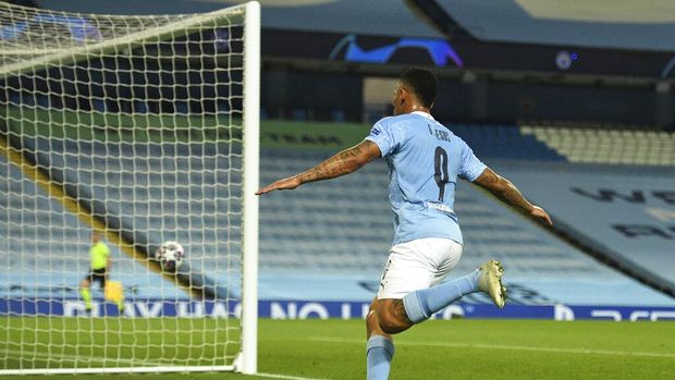 Manchester City's Gabriel Jesus celebrates after scoring his side's second goal during the Champions League, round of 16, second leg soccer match between Manchester City and Real Madrid at the Etihad Stadium in Manchester, England, Friday, Aug. 7, 2020. (Oli Scarff/Pool Photo via AP)
