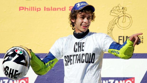 PHILLIP ISLAND, AUSTRALIA - OCTOBER 17: Valentino Rossi of Italy and the Gauloises Fortuna Yamaha Team celebrates after the Australian Motorcycle Grand Prix which is round fifteen of the MotoGP World Championship at Phillip Island Grand Prix Circuit on October 17, 2004 in Phillip Island, Australia. (Photo by Ryan Pierse/Getty Images)