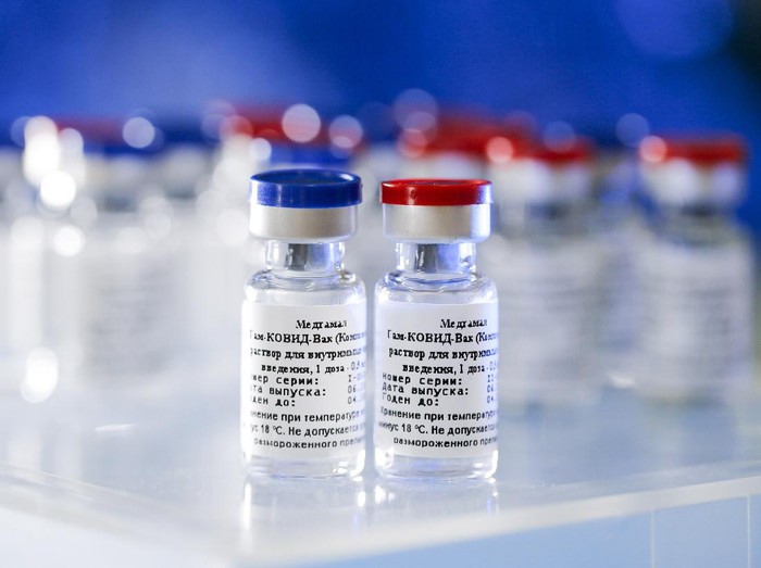 In this handout photo taken on Thursday, Aug. 6, 2020, and provided by Russian Direct Investment Fund, a new vaccine is on display at the Nikolai Gamaleya National Center of Epidemiology and Microbiology in Moscow, Russia. Russia on Tuesday, Aug. 11 became the first country to approve a coronavirus vaccine for use in tens of thousands of its citizens despite international skepticism about injections that have not completed clinical trials and were studied in only dozens of people for less than two months. (Alexander Zemlianichenko Jr/ Russian Direct Investment Fund via AP)