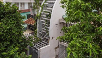 Rumah Bentuk Tabung yang Kelihatan Nyempil, Bagian Dalamnya Bikin Takjub