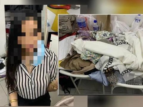 Wanita stylish mencuri di butik Wanita stylish mencuri di butik