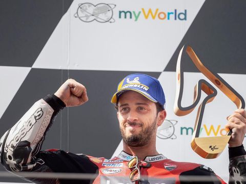 SPIELBERG, AUSTRIA - AUGUST 16: Andrea Dovizioso of Italy and Ducati Team celebrates the victory on the podium at the end of the MotoGP race during the MotoGP Of Austria - Race at Red Bull Ring on August 16, 2020 in Spielberg, Austria. (Photo by Mirco Lazzari gp/Getty Images)