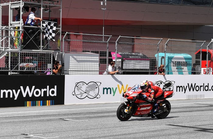 Ducatis Italian rider Andrea Dovizioso rides his bike to win the Moto GP Austrian Grand Prix at the Red Bull Ring circuit in Spielberg, Austria on August 16, 2020. (Photo by JOE KLAMAR / AFP)