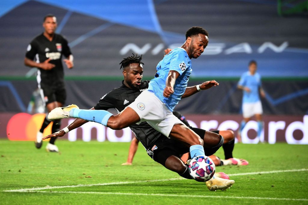 Manchester City vs Lyon LISBON, PORTUGAL - AUGUST 15: Maxwel Cornet of Olympique Lyon celebrates with teammates after scoring his team's first goal during the UEFA Champions League Quarter Final match between Manchester City and Lyon at Estadio Jose Alvalade on August 15, 2020 in Lisbon, Portugal. (Photo by Miguel A. Lopes/Pool via Getty Images)